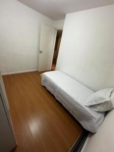 Ένα ή περισσότερα κρεβάτια σε δωμάτιο στο Apartamento por temporada 1, 2 ou 3 meses +16 φωτογραφίες