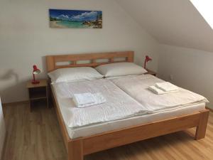 Postel nebo postele na pokoji v ubytování Ubytovanie Joli