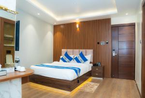 Postelja oz. postelje v sobi nastanitve Hotel Smart Durbar
