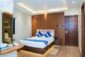 Postelja oz. postelje v sobi nastanitve Hotel Smart Durbar