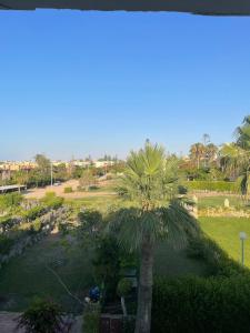 Zahrada ubytování 3BR Chalet In Marina Al Alamein + 12 fotografií