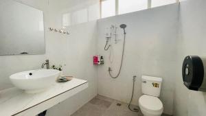 a bathroom with a sink and a toilet and a shower at TATEK Villa in Kampot +23 photos
