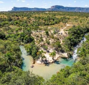 an aerial view of a river in the wilderness at Pousada em Aurora do Tocantins in Manhã