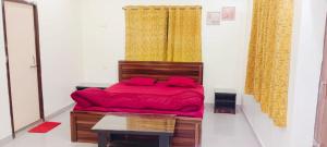 Ένα ή περισσότερα κρεβάτια σε δωμάτιο στο Nandi Homestay +1 φωτογραφίες