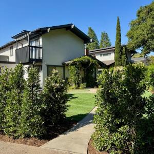 a large house with bushes in front of it at Montecito-Splendide beachside retreat in Montecito