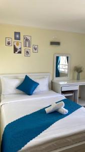 Postel nebo postele na pokoji v ubytování HUY HOANG II Hotel - Da Lat
