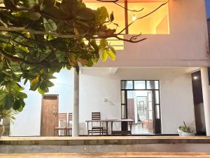 a view of the dining room of a house at Jess Beach Villa in Galle