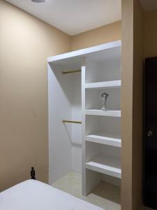 Postel nebo postele na pokoji v ubytování Apartamento moderno con todo lo que necesitas