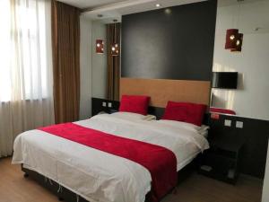 Postel nebo postele na pokoji v ubytování Super 8 Hotel Beijing New National Exhibition Yumin Street