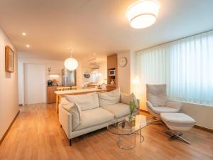 a living room with a couch and a table at Stay Cheonglim 靑林 in Seoul