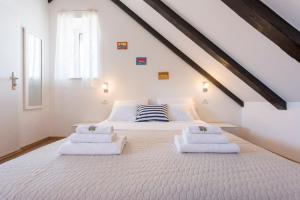 Postel nebo postele na pokoji v ubytování Agata House Hvar