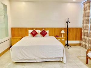 Uma cama ou camas num quarto em SÀI GÒN - BẠC LIÊU Hotel