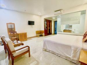 Uma televisão e/ou sistema de entretenimento em SÀI GÒN - BẠC LIÊU Hotel