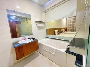 Uma cama ou camas num quarto em SÀI GÒN - BẠC LIÊU Hotel