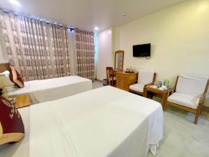 Uma televisão e/ou sistema de entretenimento em SÀI GÒN - BẠC LIÊU Hotel