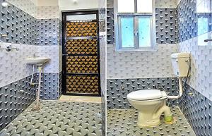 ein Bad mit WC und Fenster in der Unterkunft Hill view resort in Jaipur