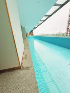 Πισίνα στο ή κοντά στο Xigang Xingsha Bay International Hotel