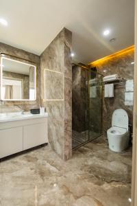 Ένα μπάνιο στο Xigang Xingsha Bay International Hotel