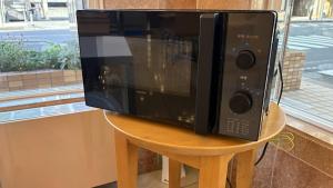 TV a/nebo společenská místnost v ubytování Toyoko Inn Wako-shi Ekimae