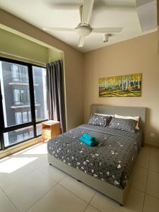 En eller flere senge i et værelse på Midhills Genting Highland