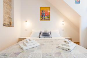 Postel nebo postele na pokoji v ubytování Agata House Hvar