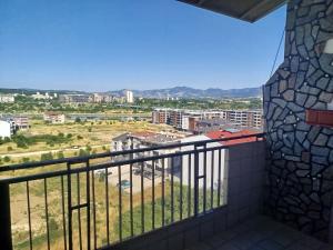 a balcony with a view of a city at Galina Apartment in Kŭrdzhali