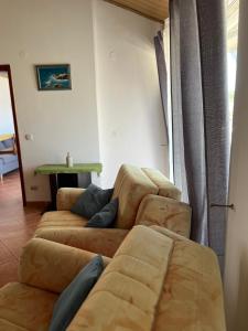 Posezení v ubytování The Olive Tree