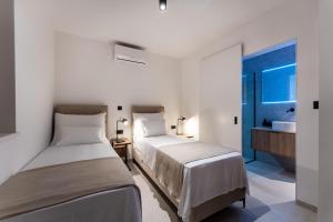 Postel nebo postele na pokoji v ubytování Cortile House + 149 fotografií