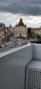 a view of a city from a balcony at Central 21 in Târgu-Mureş