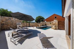 Bazén v ubytování Cortile House nebo v jeho okolí