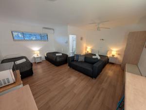 Posezení v ubytování Moffat Beach Motel Caloundra
