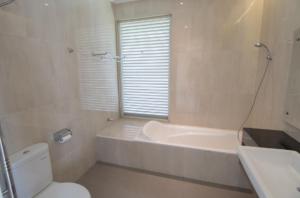 Koupelna v ubytování Sevilla Resort Magelang