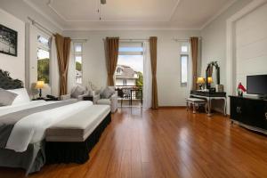 Postel nebo postele na pokoji v ubytování Sam Tuyen Lam Resort