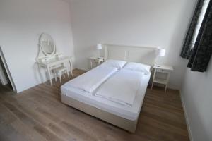 Postel nebo postele na pokoji v ubytování B&B Castanea