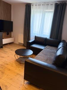 Posedenie v ubytovaní Apartament z łożem małżeńskim - bezpłatny parking