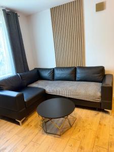 Posedenie v ubytovaní Apartament z łożem małżeńskim - bezpłatny parking
