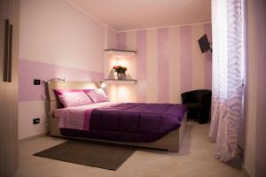 Postel nebo postele na pokoji v ubytování Casa Vacanze Evelina