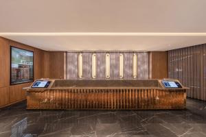 Beijing Chaoyang Park Crystal Orange Hotel電視和／或娛樂中心