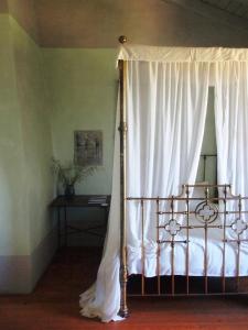 
Uma cama ou camas num quarto em Convento Senhora da Vitória
