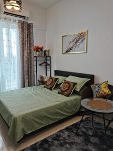 Postel nebo postele na pokoji v ubytování BangiSky Homestay, Quite, Strategic & Convinient