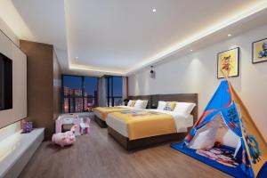 Letto o letti in una camera di Changsha Feiji Hotel