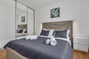 Posteľ alebo postele v izbe v ubytovaní Apartment San Marino