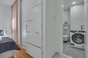 Posteľ alebo postele v izbe v ubytovaní Apartment San Marino