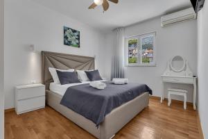 Posteľ alebo postele v izbe v ubytovaní Apartment San Marino