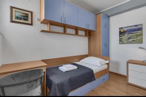 Posteľ alebo postele v izbe v ubytovaní Apartment San Marino