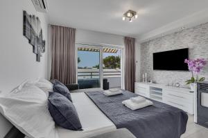 Posteľ alebo postele v izbe v ubytovaní Apartment San Marino