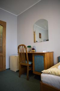 Postel nebo postele na pokoji v ubytování Hotel u Crlíků