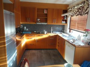 Kuchyň nebo kuchyňský kout v ubytování BSG Apartments