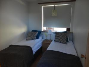 Postel nebo postele na pokoji v ubytování BSG Apartments