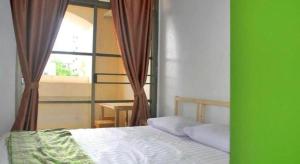 Кровать или кровати в номере The Twins Hostel +57 фотографий